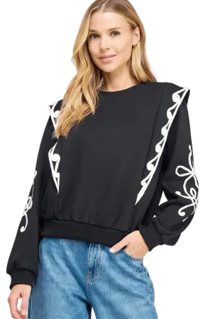Black embroidered ruffle sweatshirt top
