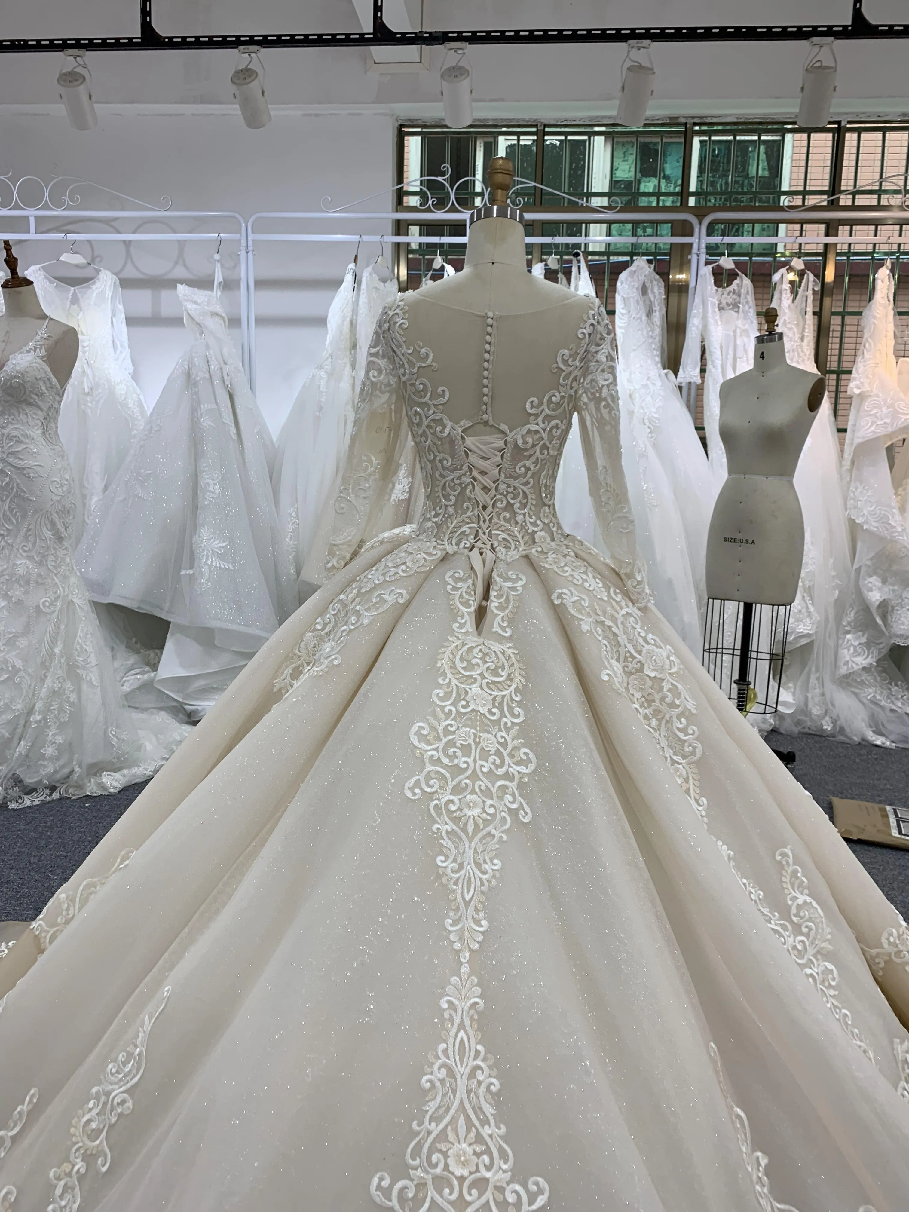 BYG fashion design champagne wedding dress chapel train