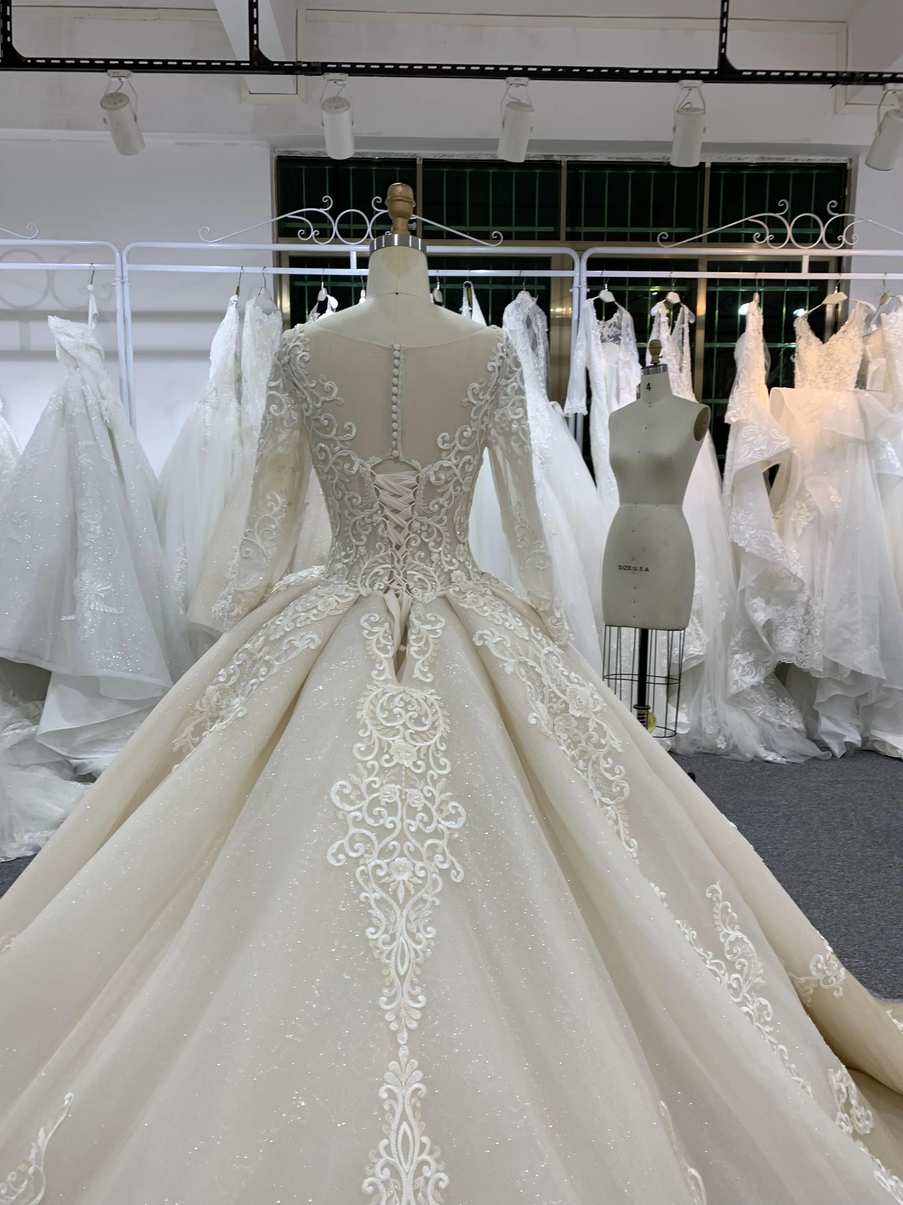 BYG fashion design champagne wedding dress chapel train