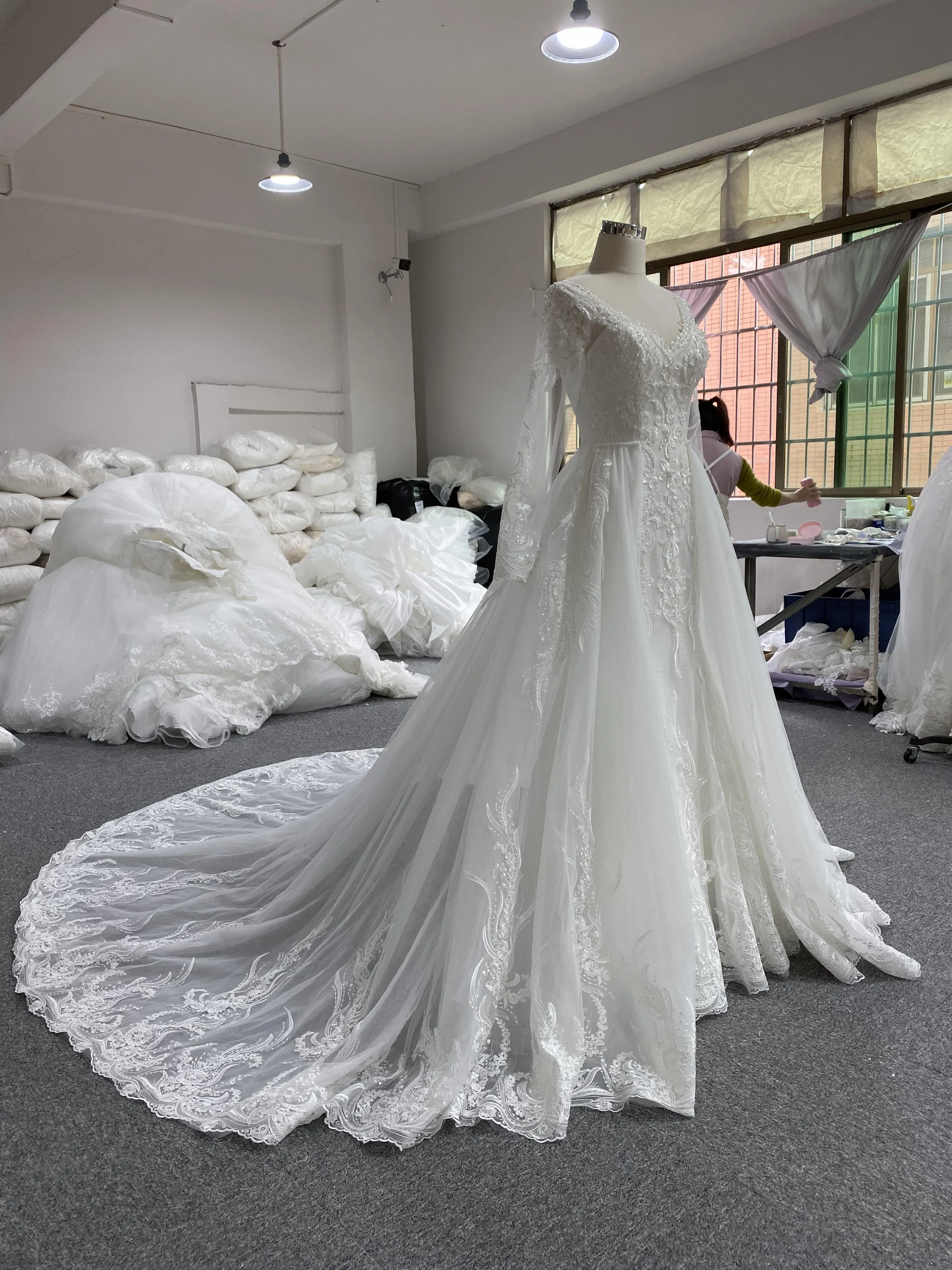 BYG long sleeves V-neck lace wedding dress with detachable train