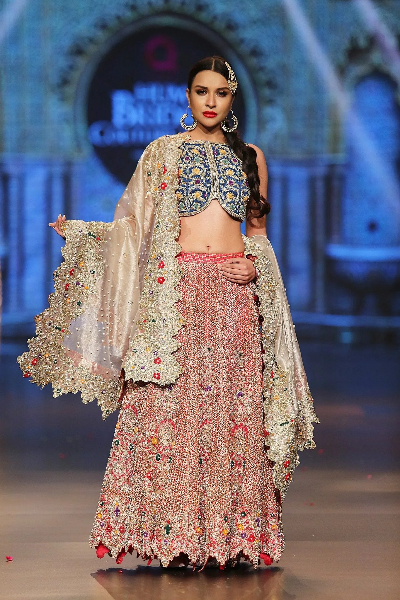 Designer embroidered lehnga dress in blue, gold and red color # B3354