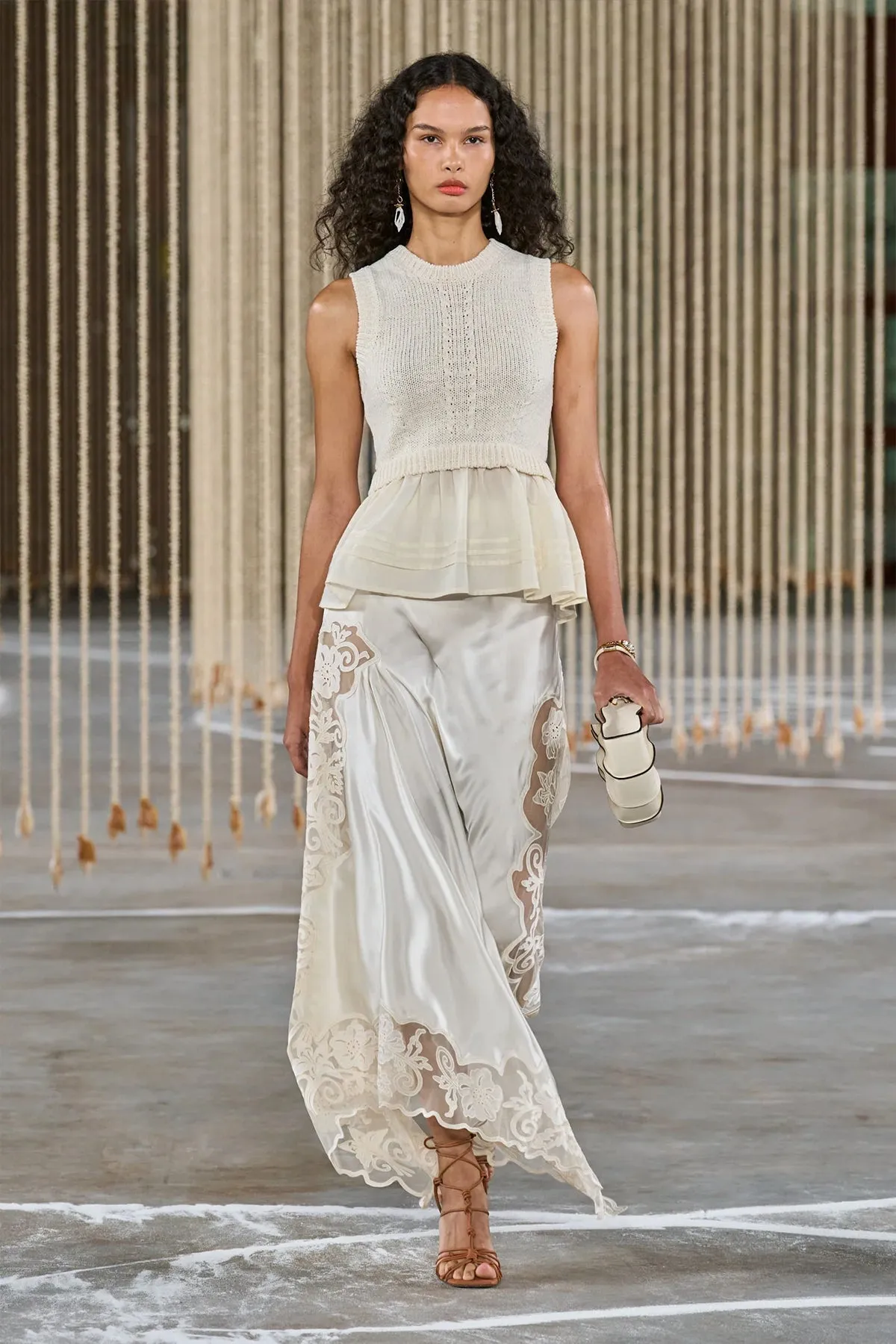 Edda Sleeveless Peplum Top in Ivory