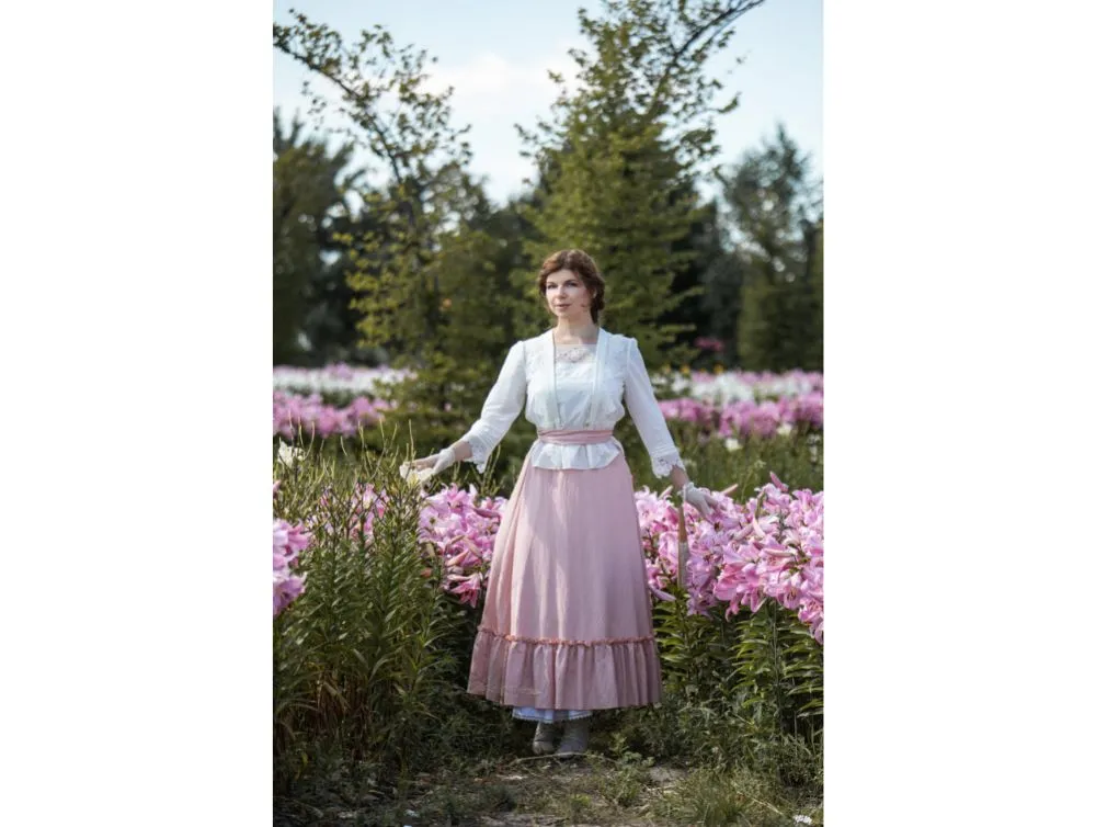 Edwardian style costume with pink skirt