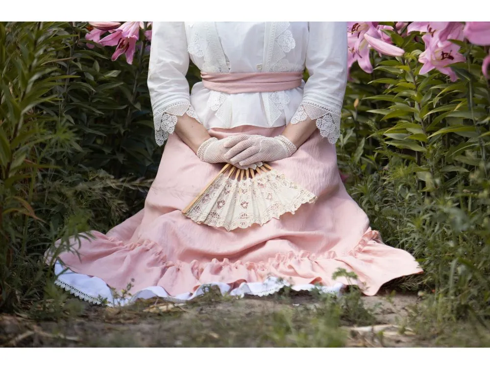 Edwardian style costume with pink skirt