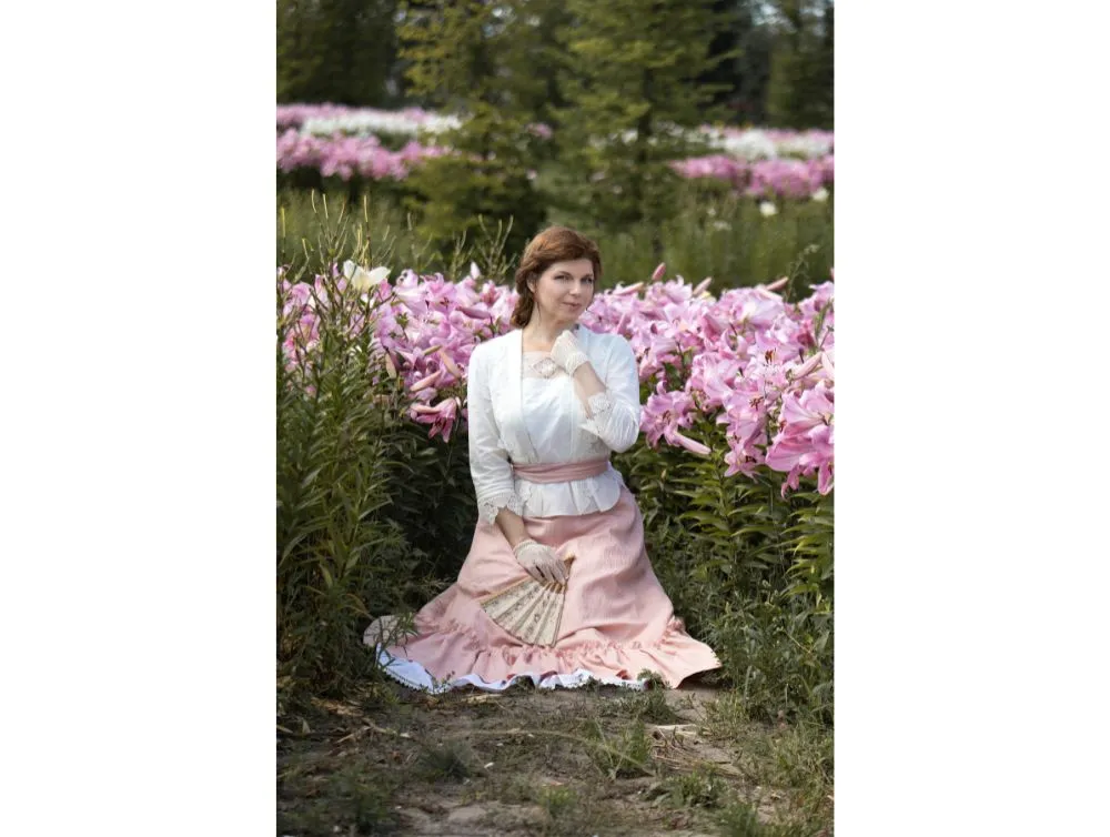 Edwardian style costume with pink skirt