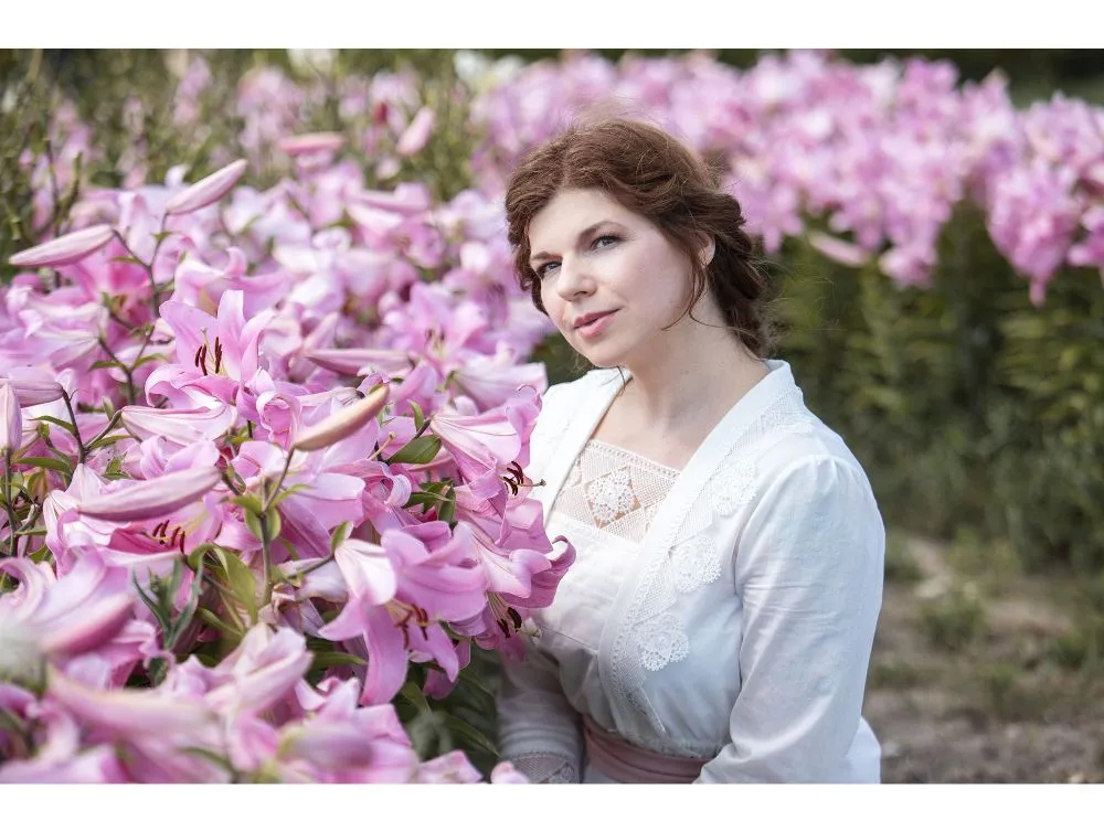 Edwardian style costume with pink skirt