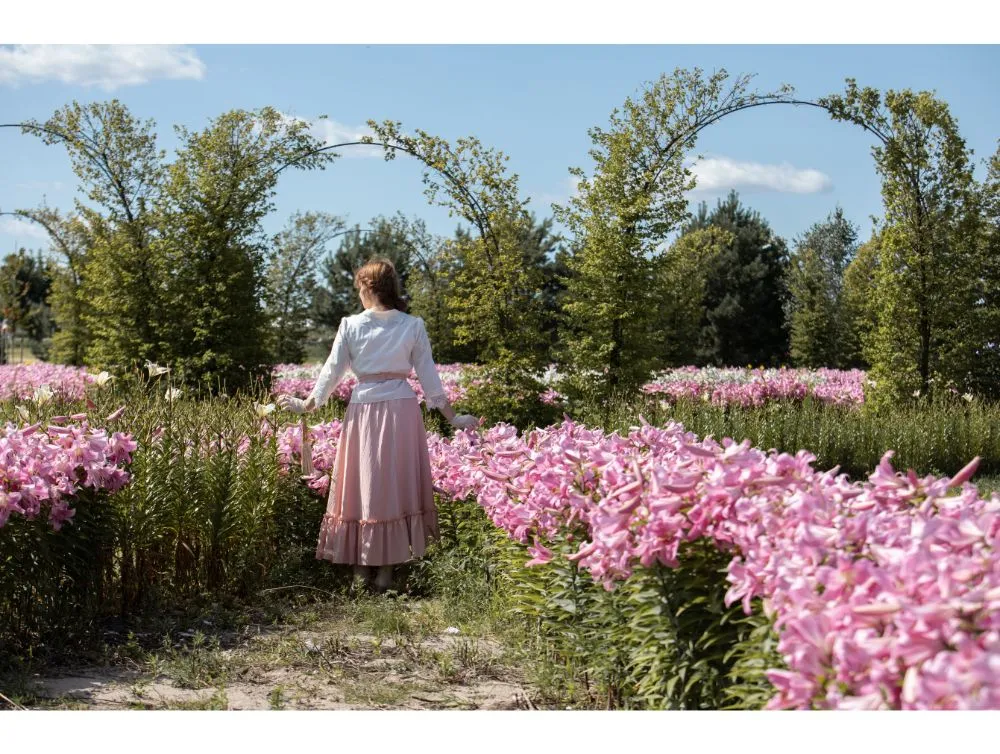 Edwardian style costume with pink skirt