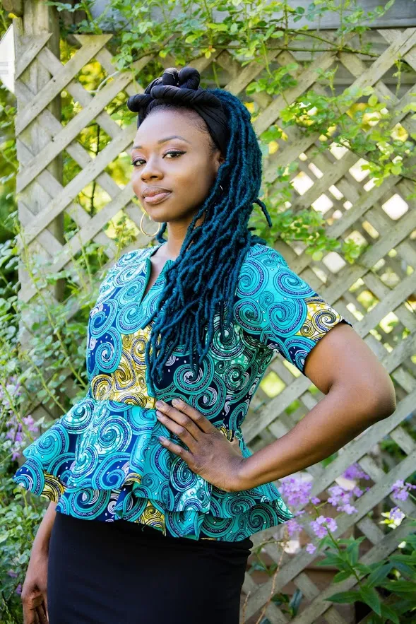 Egbe- Double peplum Top