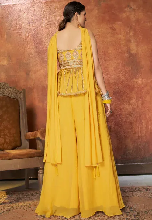 Embroidered Georgette Peplum Style Pakistani Suit in Mustard