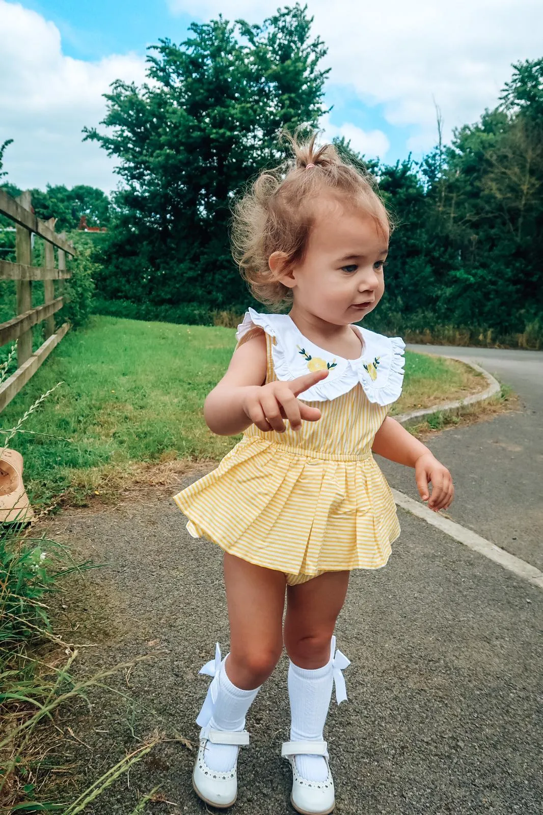 Evelyn Stripe Peplum Romper