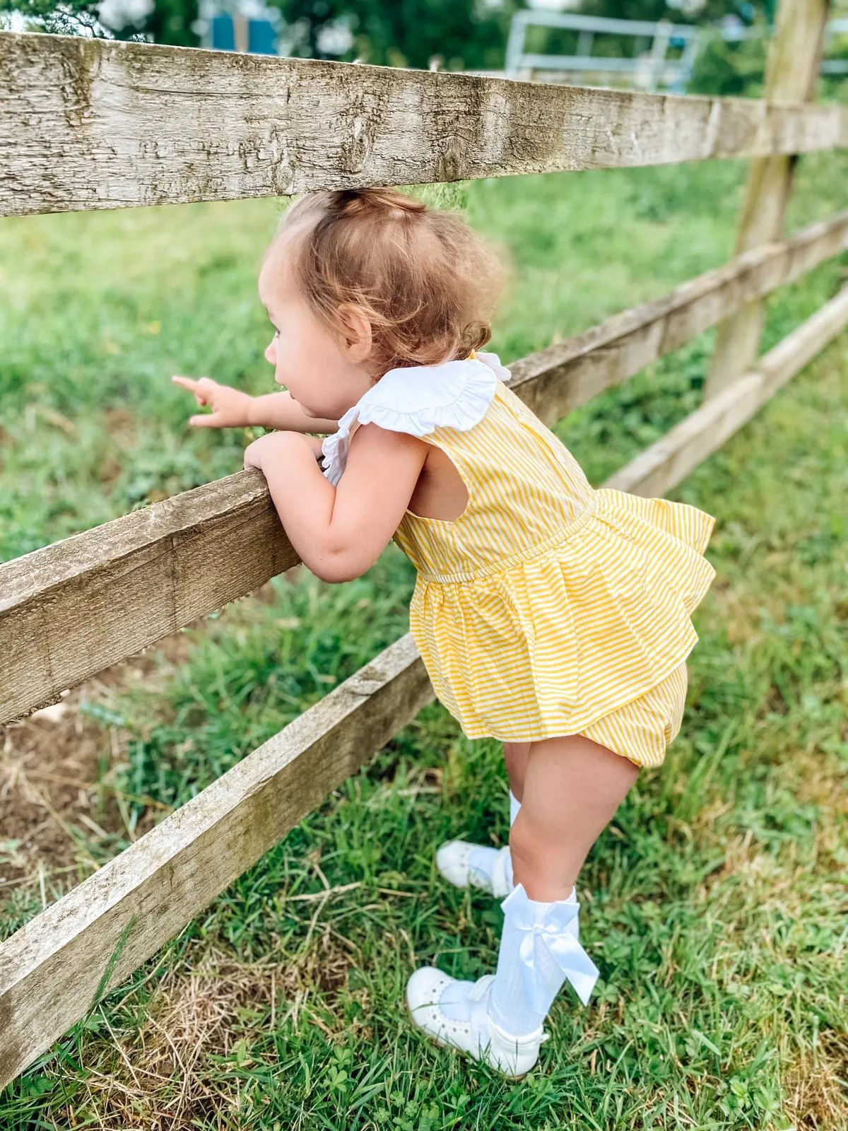 Evelyn Stripe Peplum Romper