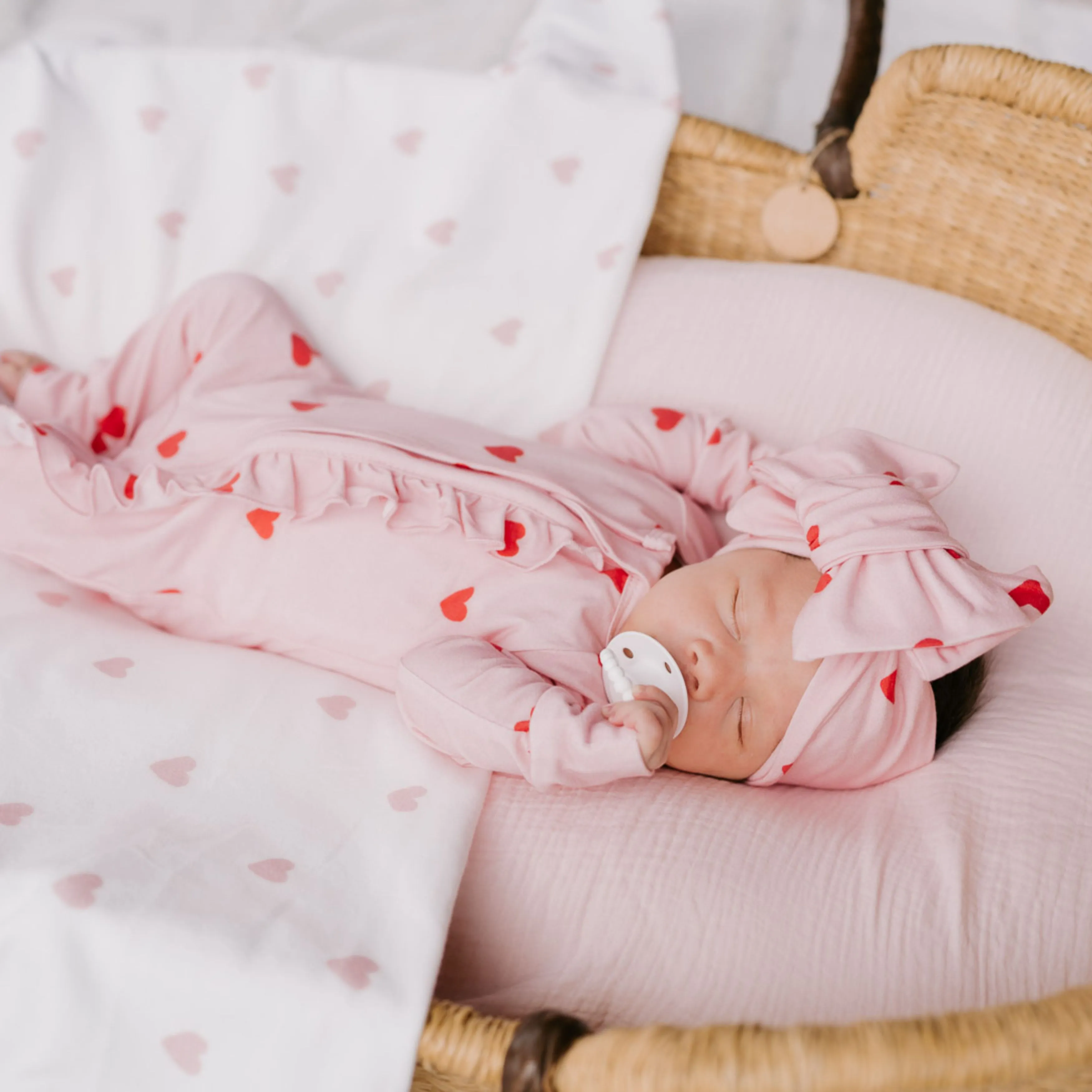 FRILL ZIP ROMPER | RED HEARTS