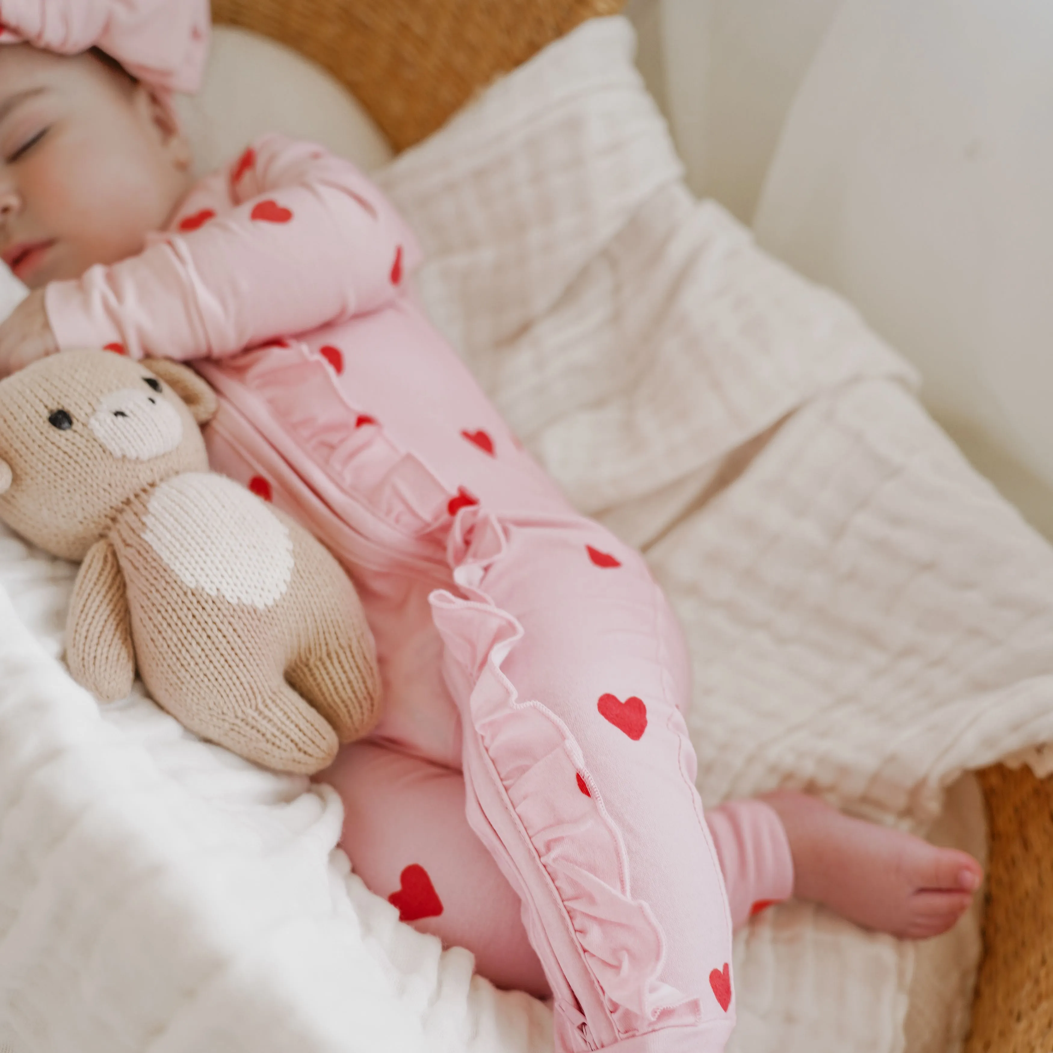 FRILL ZIP ROMPER | RED HEARTS