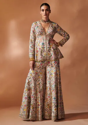 Ivory embroidered peplum sharara set