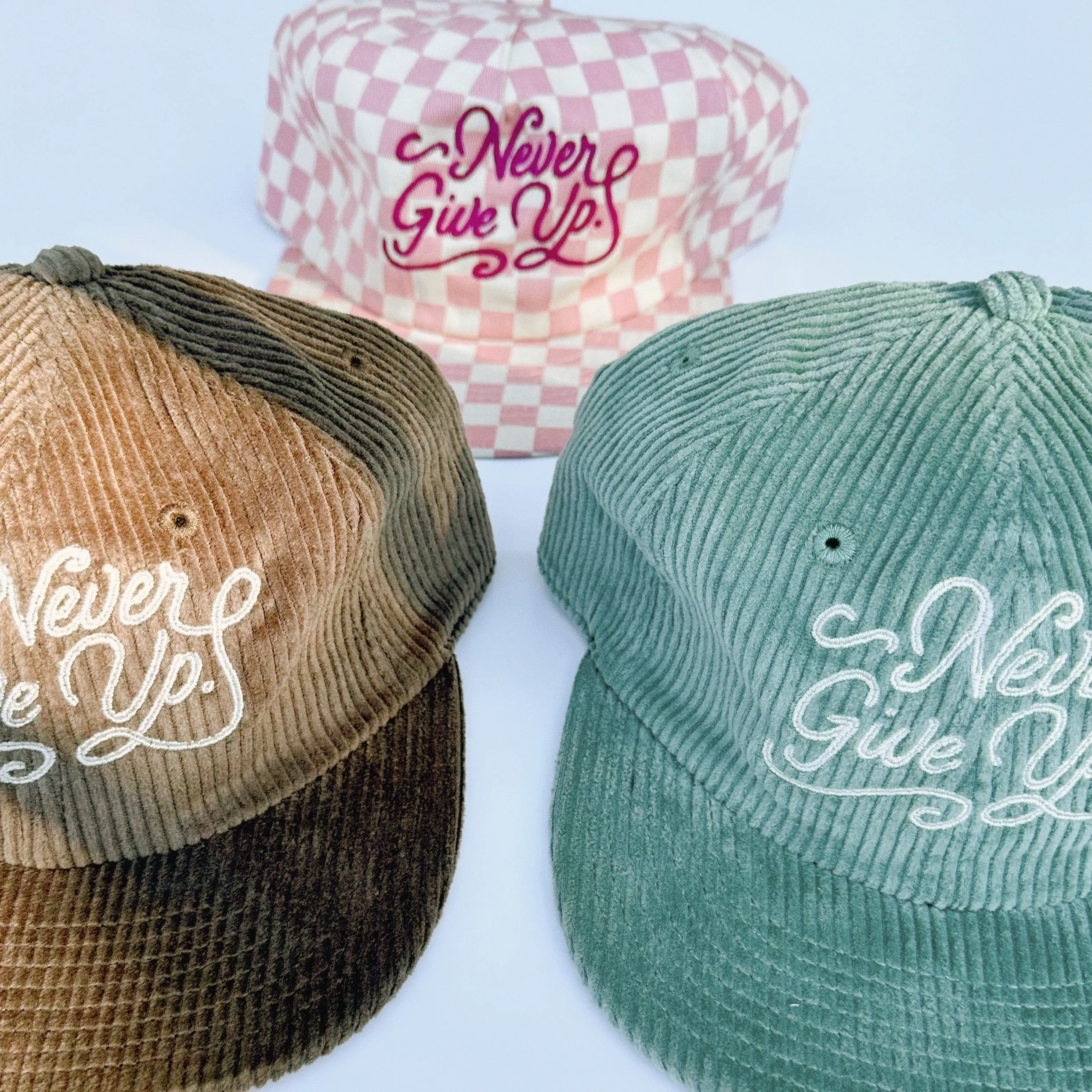 NEVER GIVE UP. CORD HAT