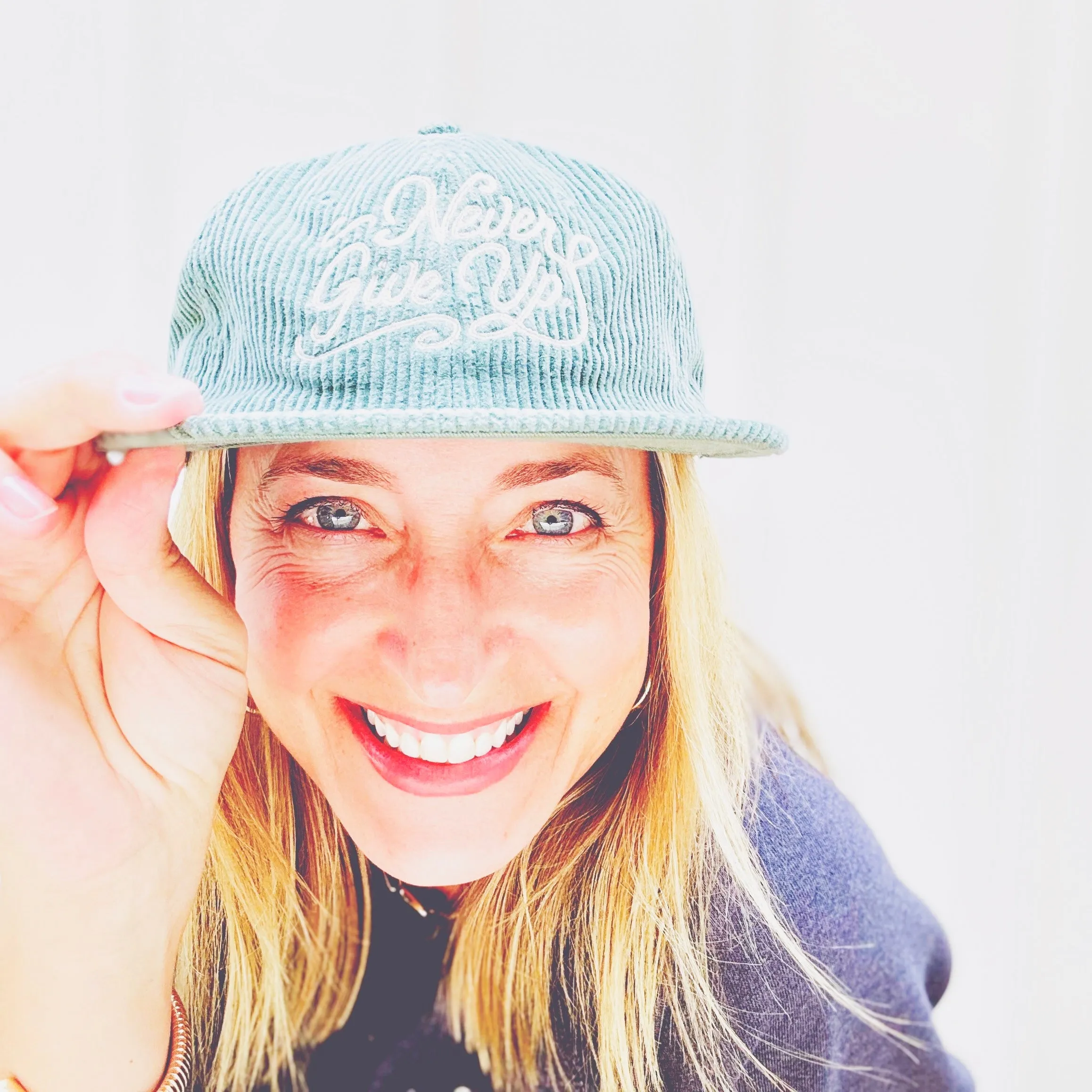 NEVER GIVE UP. CORD HAT