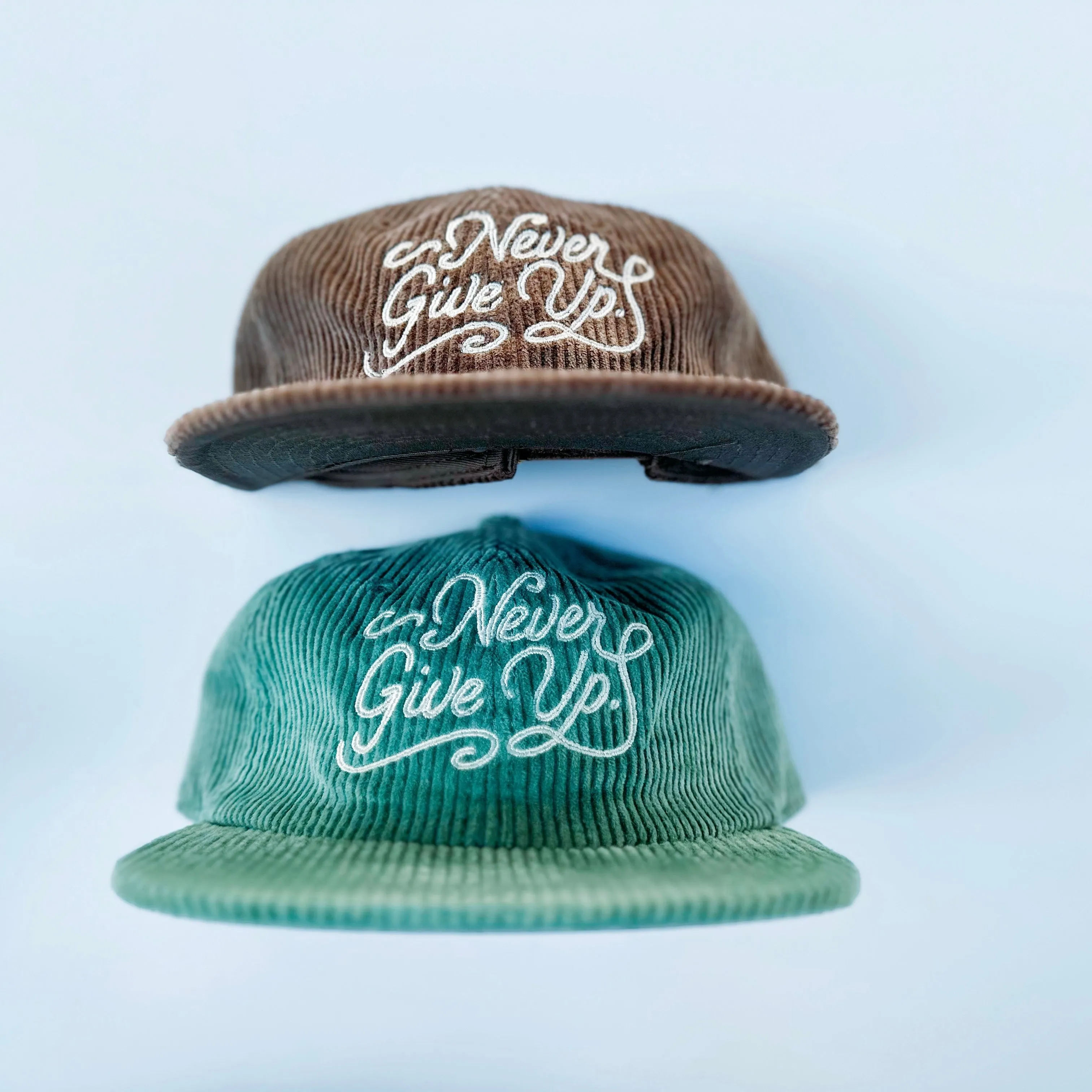 NEVER GIVE UP. CORD HAT