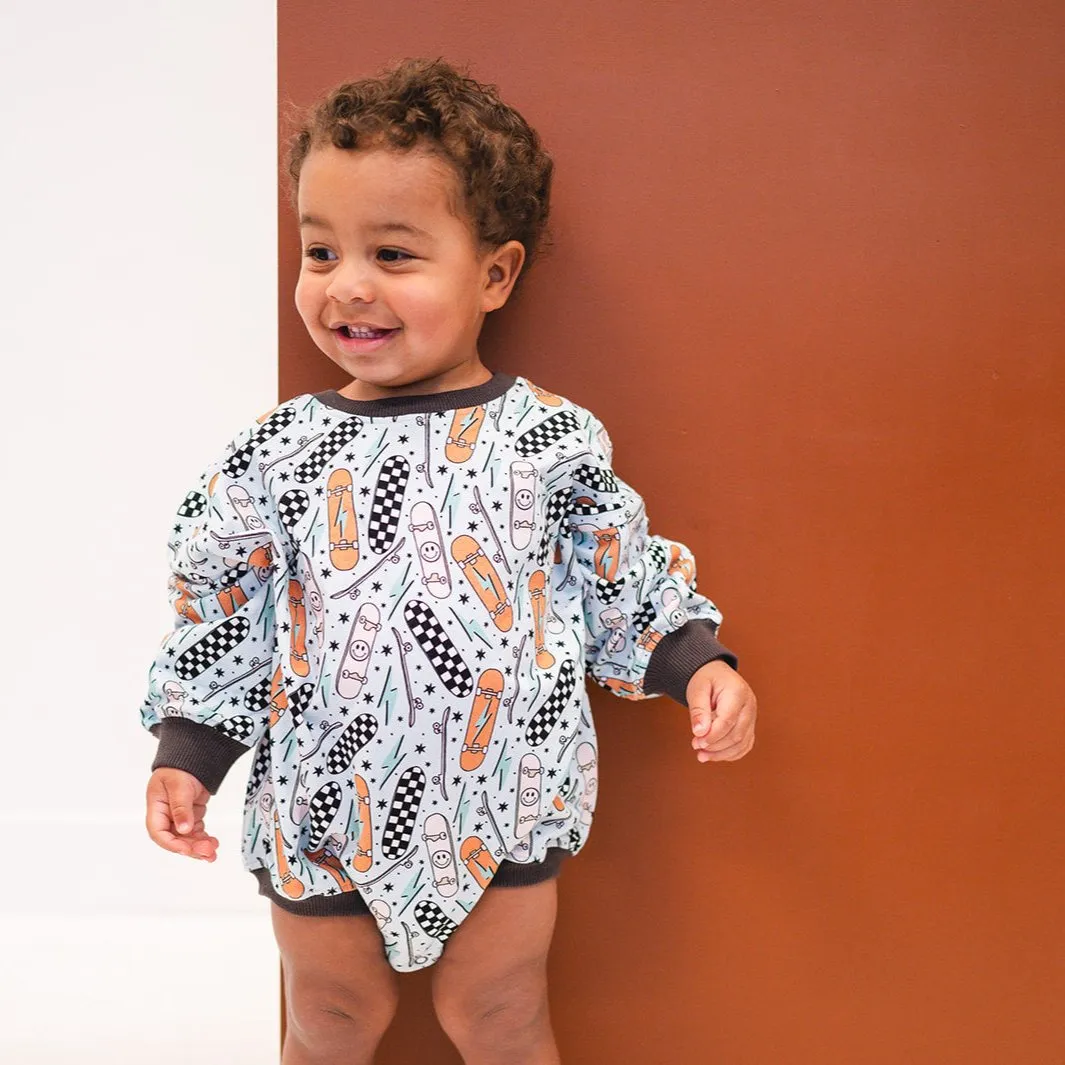 Oversized Cozy Romper - Retro Skateboard