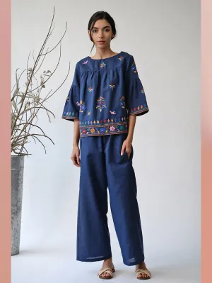 UMBAR by Payal Pratap   I   Top Dholavira    I    An Embroidered Top With Subtle And Special Multicolour Threadwork Inspired From The Kutch Region With Peplum Sleeves And An Easy Fit  I  An All Year Staple For Your Day Wear Wardrobe