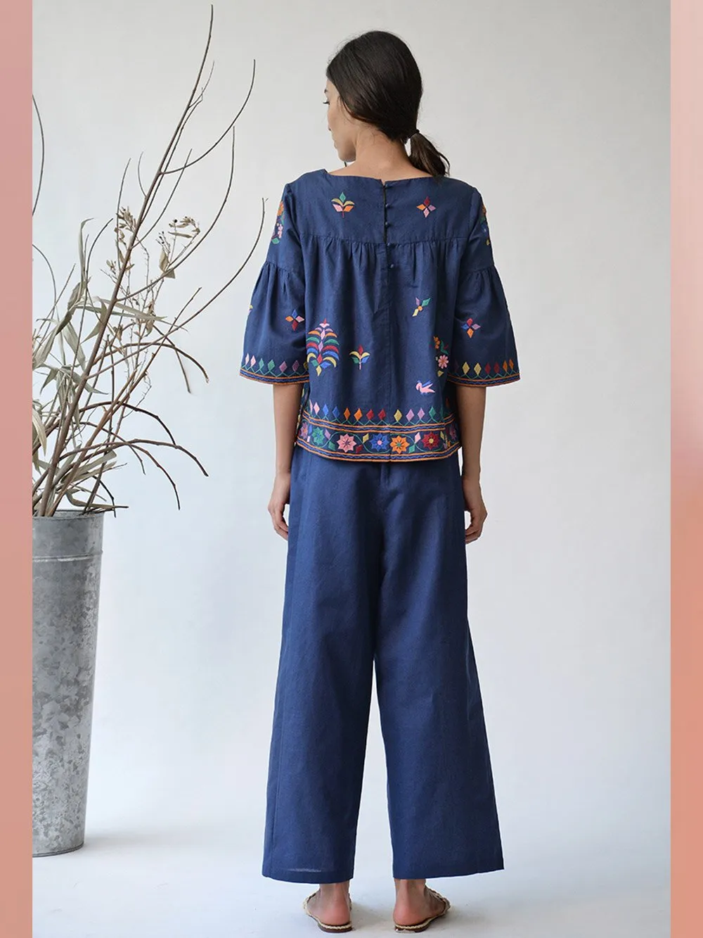 UMBAR by Payal Pratap   I   Top Dholavira    I    An Embroidered Top With Subtle And Special Multicolour Threadwork Inspired From The Kutch Region With Peplum Sleeves And An Easy Fit  I  An All Year Staple For Your Day Wear Wardrobe