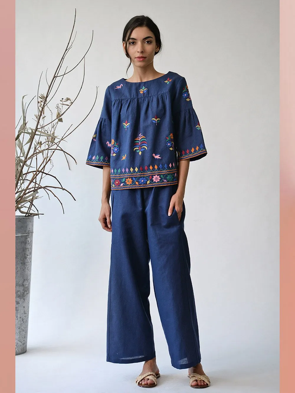 UMBAR by Payal Pratap   I   Top Dholavira    I    An Embroidered Top With Subtle And Special Multicolour Threadwork Inspired From The Kutch Region With Peplum Sleeves And An Easy Fit  I  An All Year Staple For Your Day Wear Wardrobe