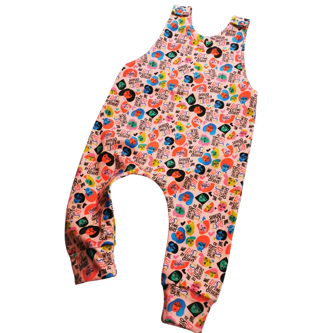We Rise by Lifting Others Romper