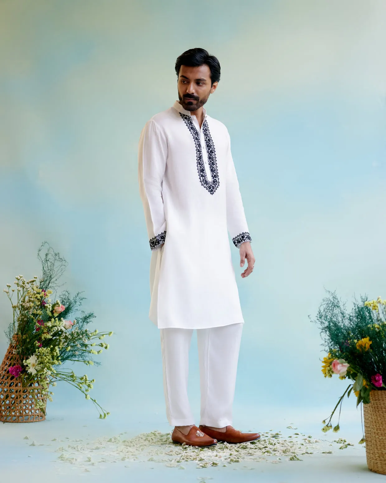 White Muslin Embroidered Kurta
with Pure Cotton Narrow Pants