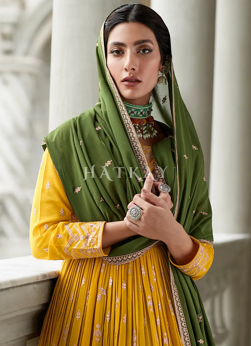 Yellow And Green Embroidery Peplum Anarkali Lehenga